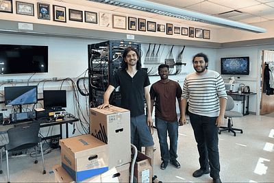BCI employees standing in office 