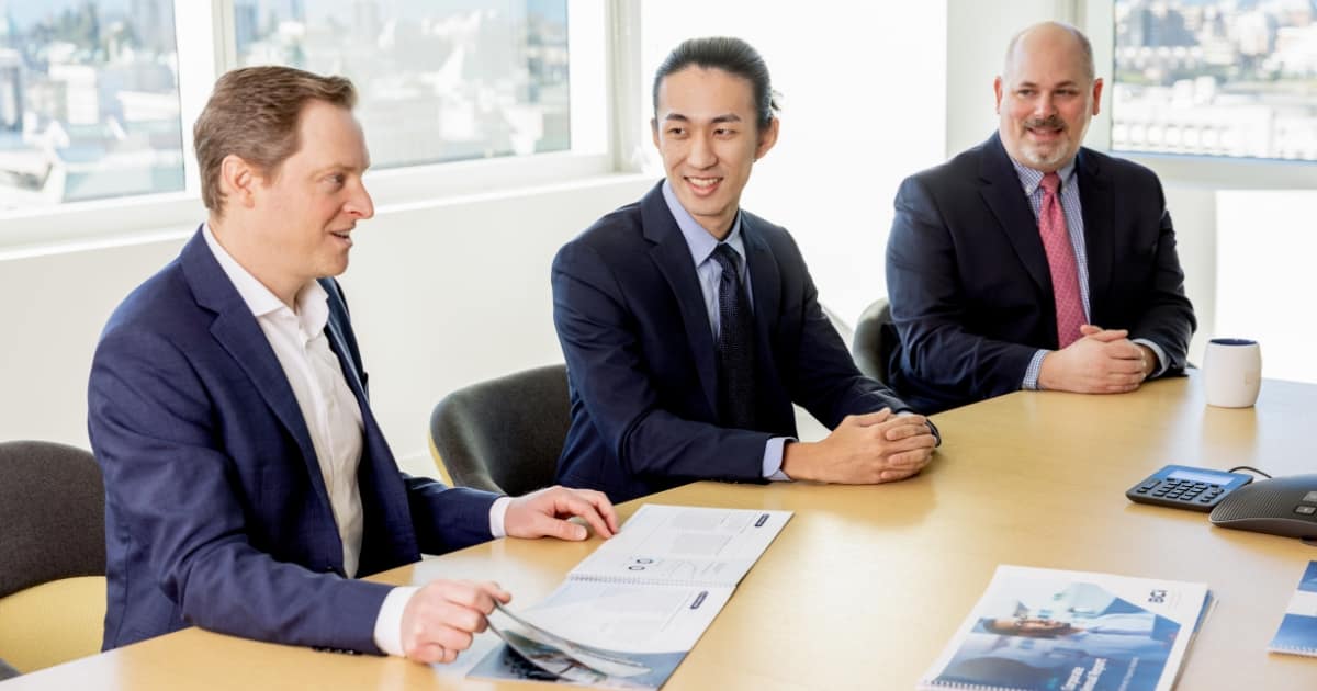 BCI employees in a meeting to discuss annual report BCI employees in a meeting to discuss annual report