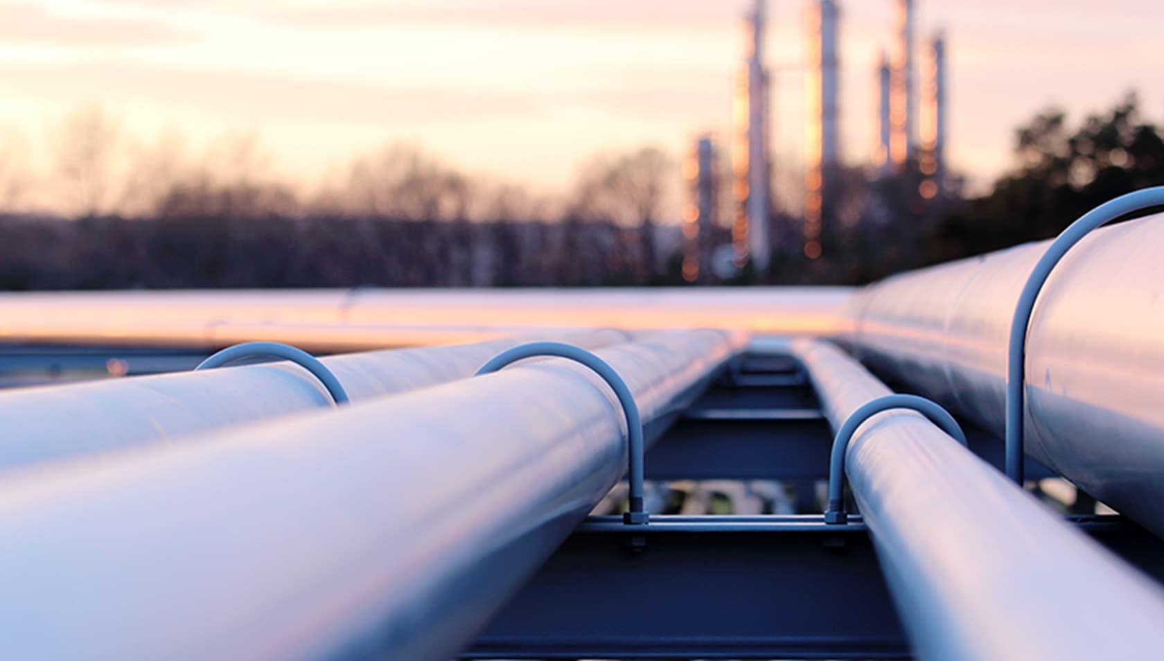 Closeup of gas pipes at sunrise