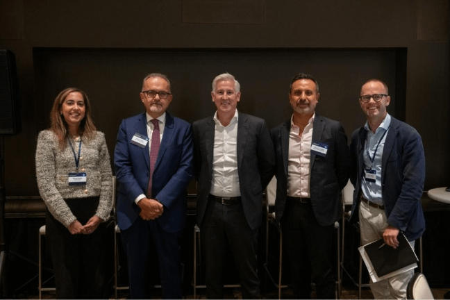 Lincoln Webb and other panelists standing together