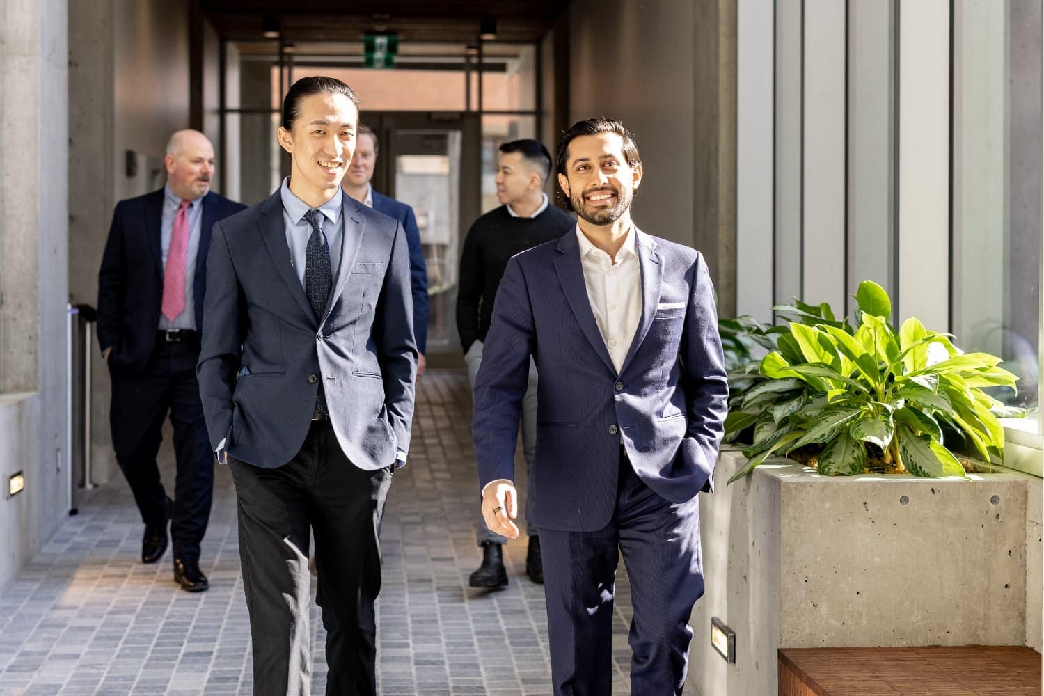 A group of people in business attire A group of people in business attire