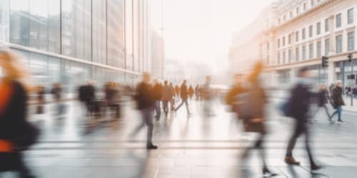 Blurred image of people moving fast in a city Blurred image of people moving fast in a city